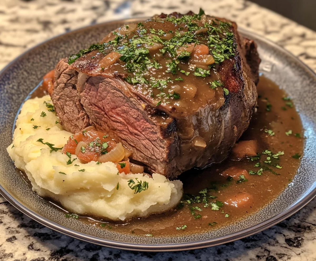 Pressure-cooked bone-in shank served with sauce and mashed potatoes