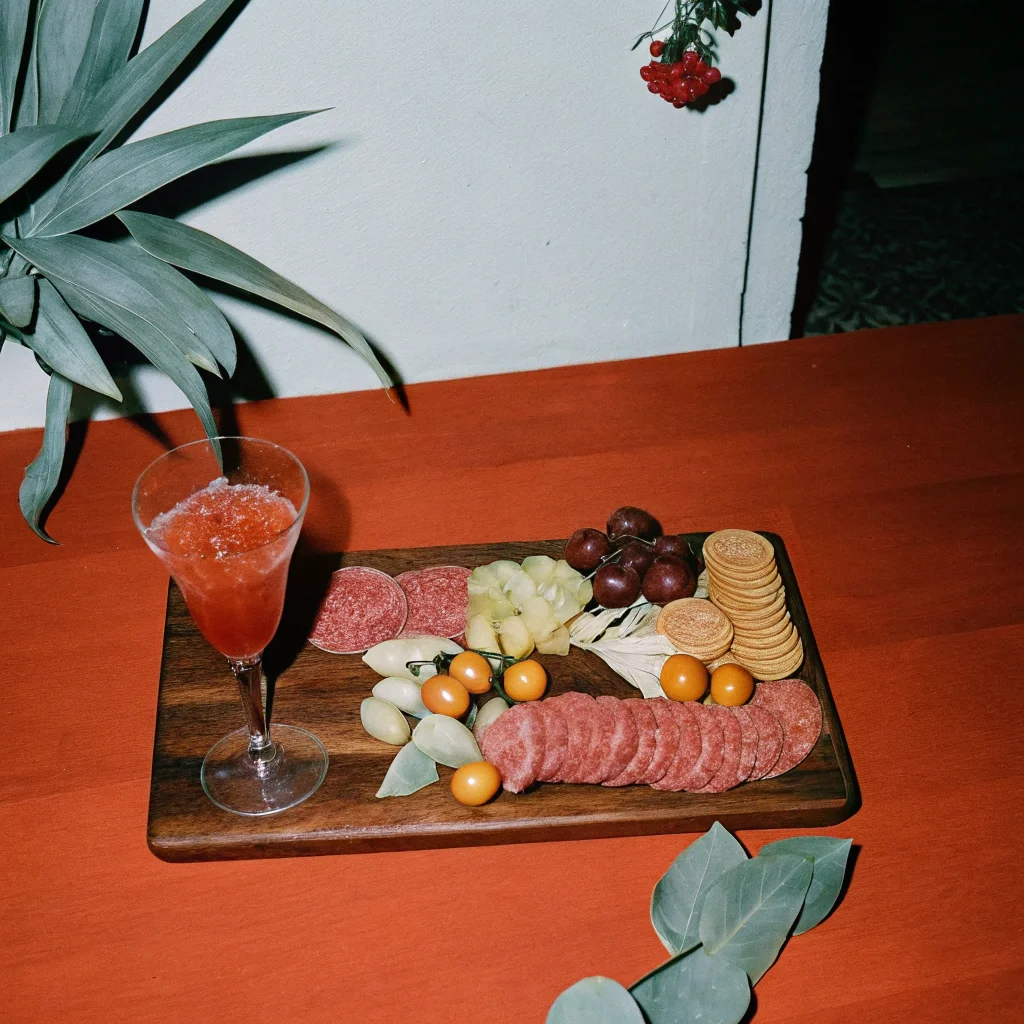 charcuterie board paired with cocktails